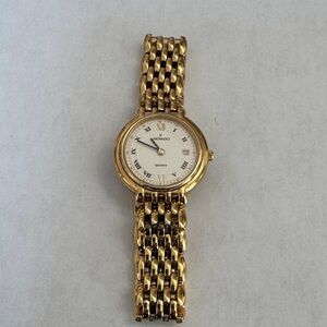 Movado Gold Tone Linked Bracelet Watch with White Face